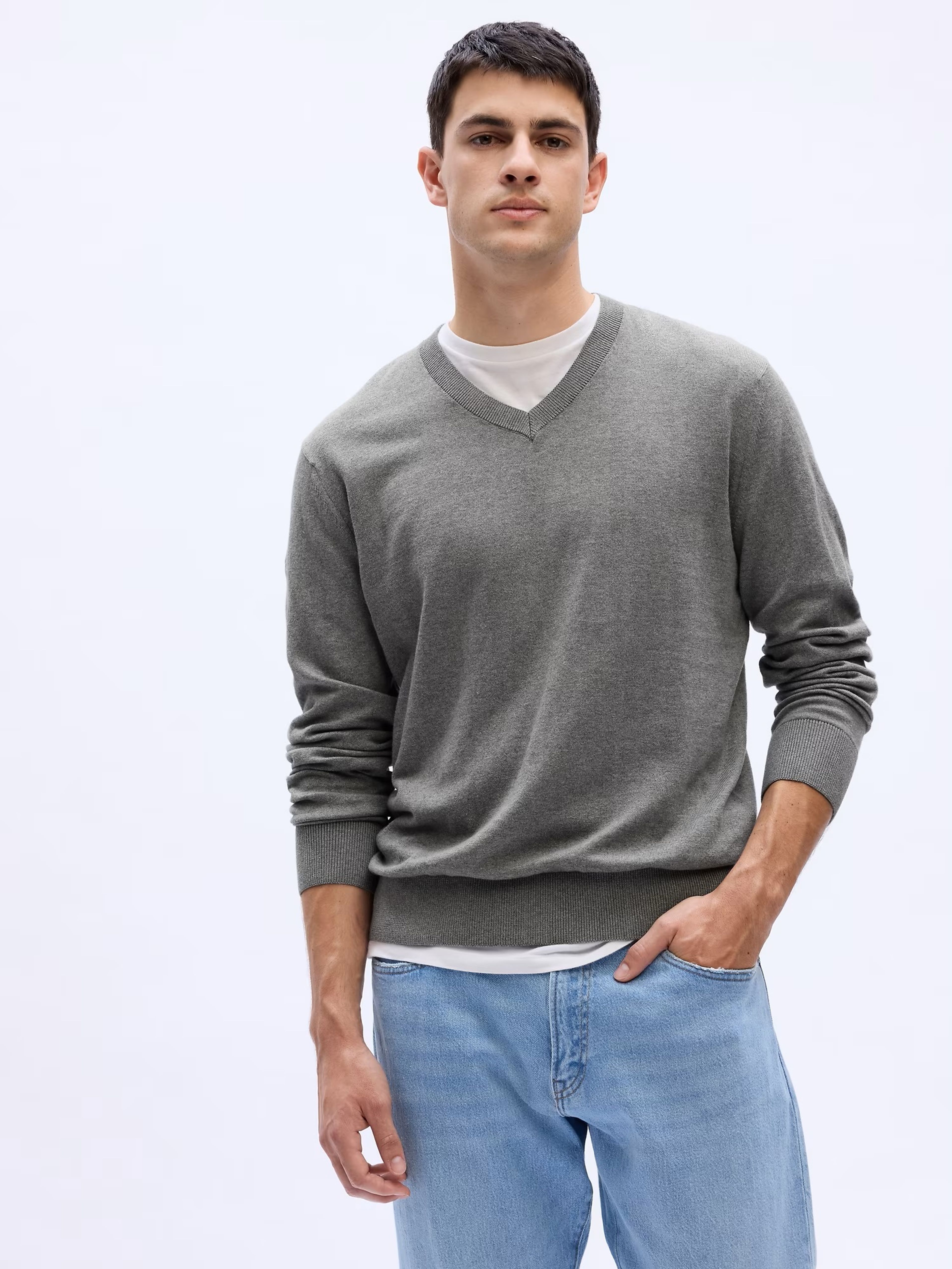 Pletený svetr s výstřihem V